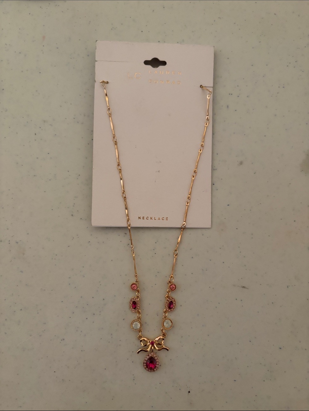 LC Lauren Conrad Gold-Tone Necklace with Pink Stones and Bow Pendant